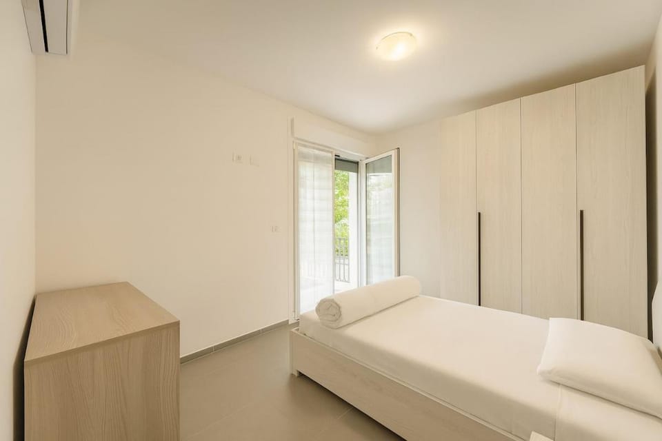 Garden apartment with parking Apartment in Lignano Sabbiadoro