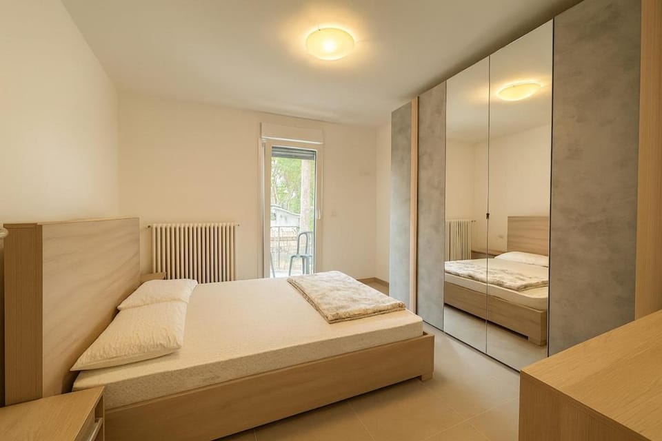Garden apartment with parking Apartment in Lignano Sabbiadoro