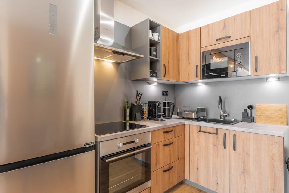 Kitchen or kitchenette, oven, stove