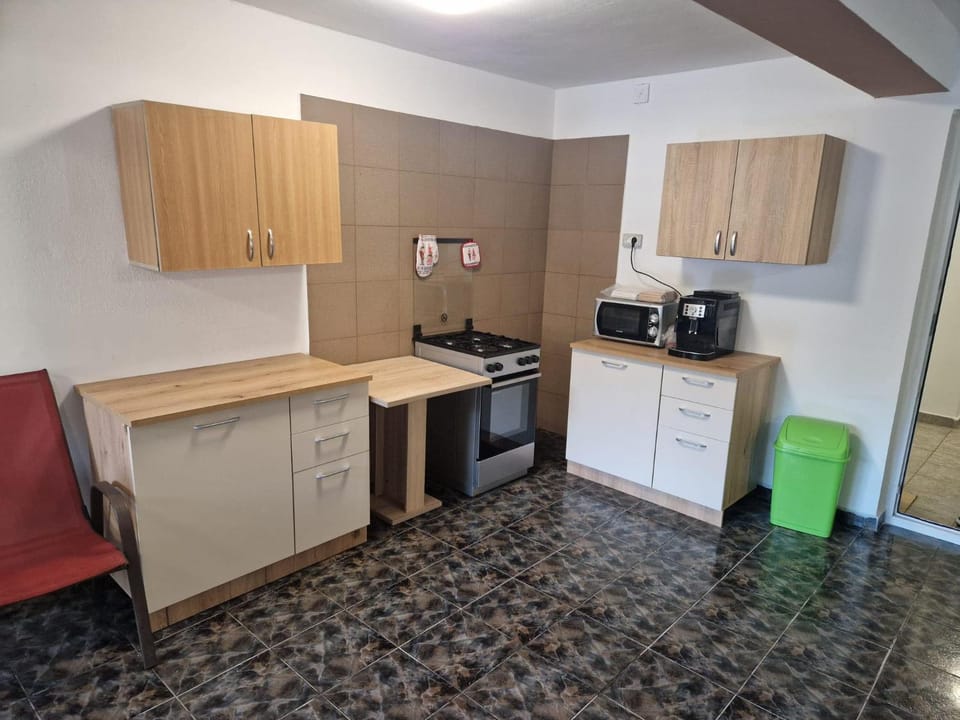 Kitchen or kitchenette, oven, stove