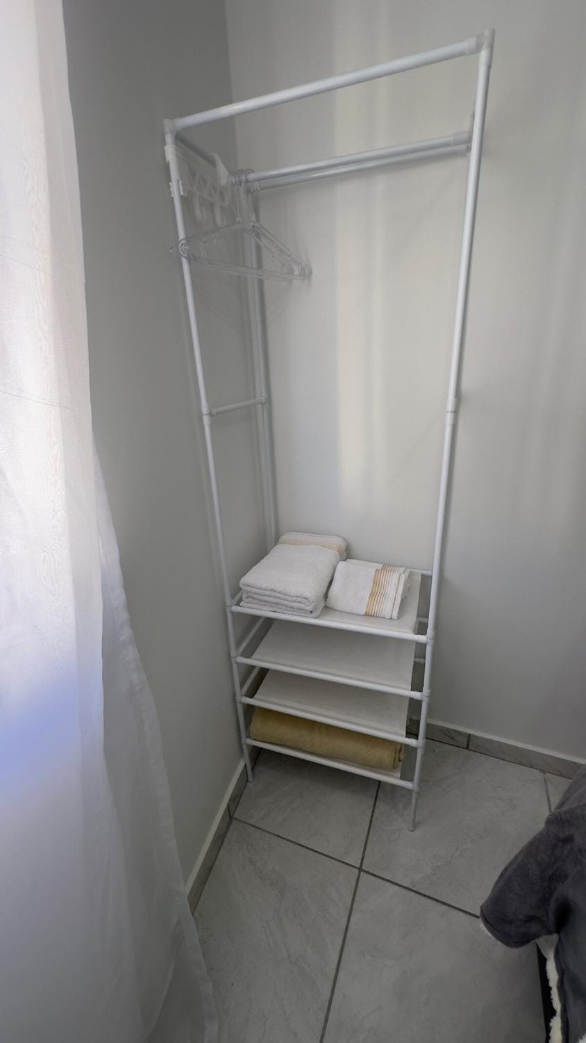 Photo of the whole room, Bedroom, towels, wardrobe