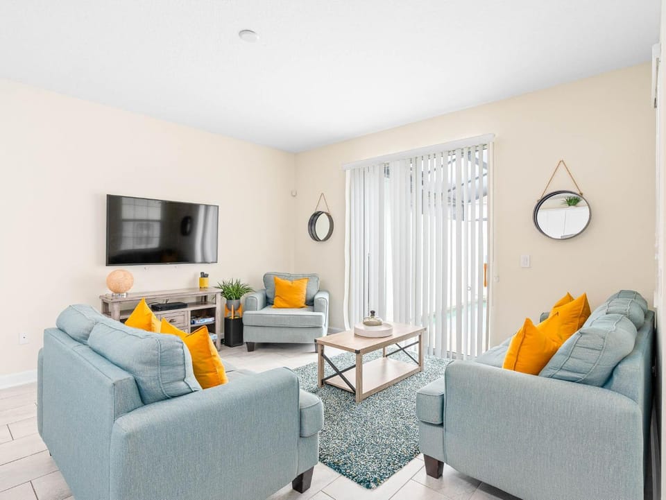 View (from property/room), Living room, Seating area, Pool view, Swimming pool