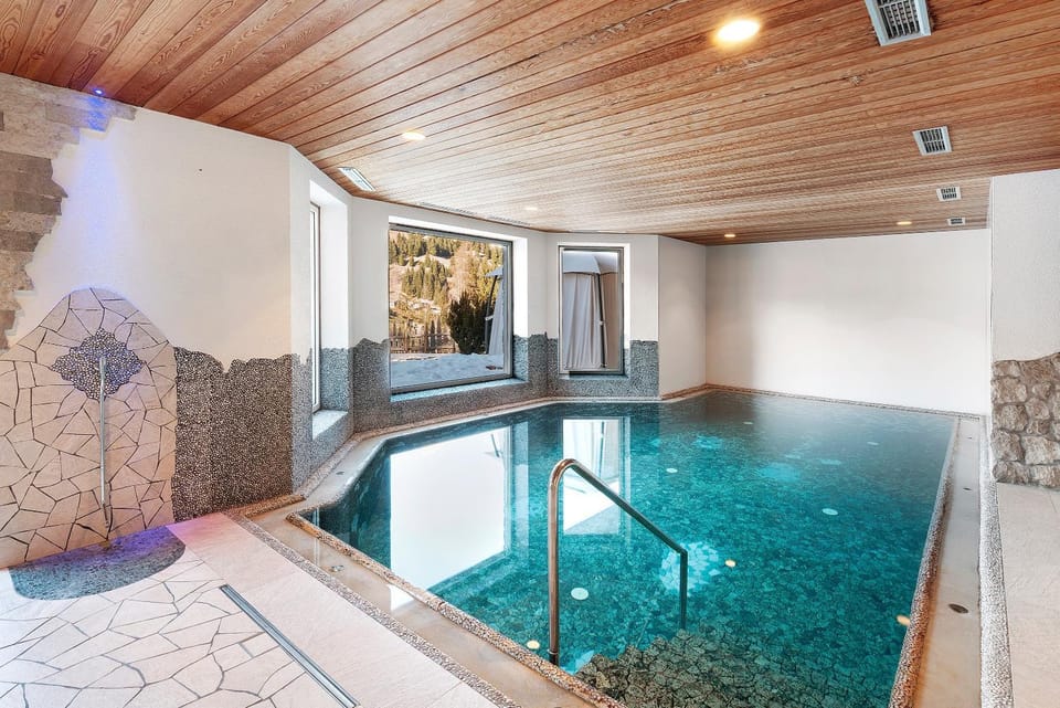 Property building, Living room, Swimming pool