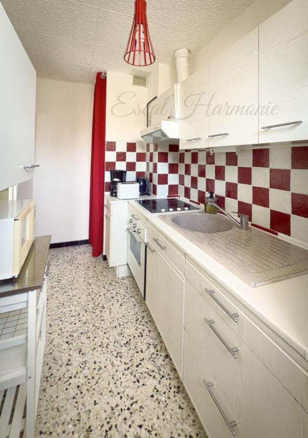 Kitchen or kitchenette, stove