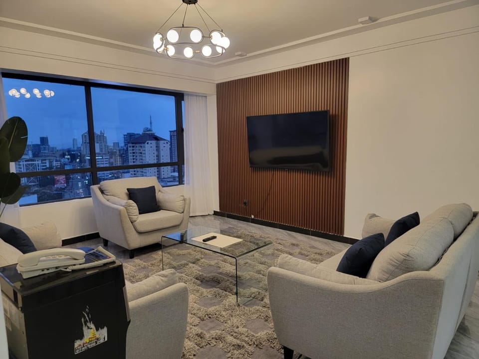 classy tastefully furnished executive three bedroom apartment with fully equipped gym ample parking space swimming pool children playing ground and amazing scenic views Apartment in Nairobi County