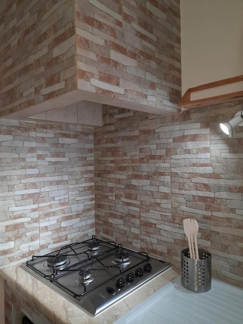 Kitchen or kitchenette, stove
