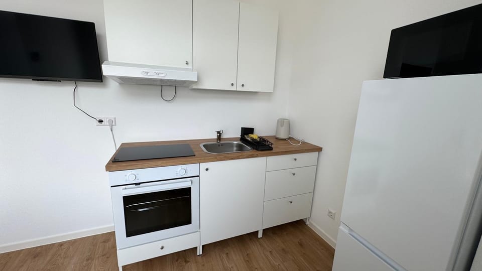 Kitchen or kitchenette, oven, stove