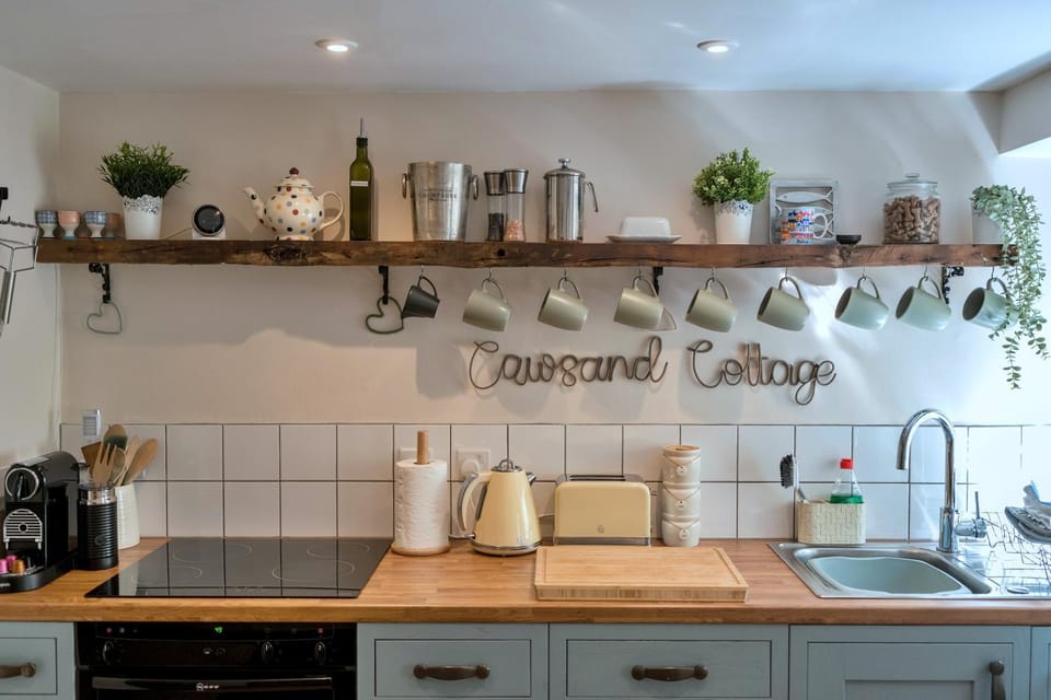 Kitchen or kitchenette, stove, toaster