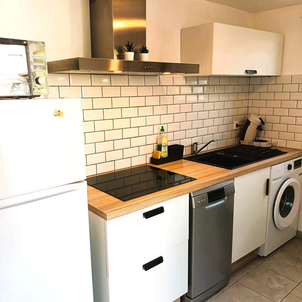 dishwasher, microwave, stove, washing machine, kitchen
