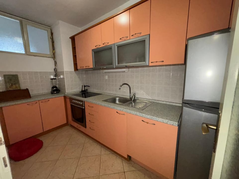Kitchen or kitchenette, dishwasher, oven, stove