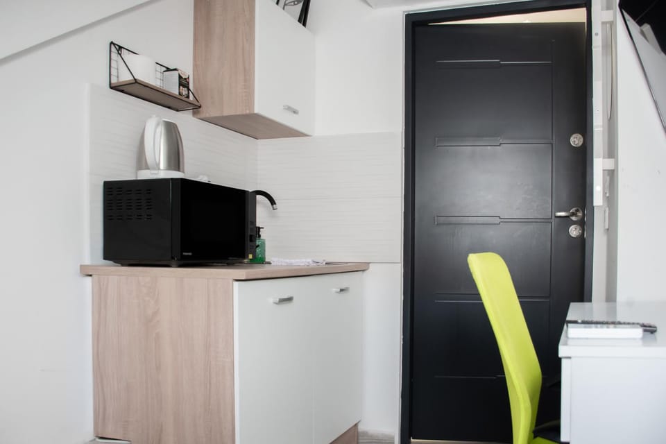 Kitchen or kitchenette, Seating area, minibar, oven