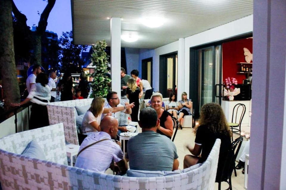 Property building, People, Seating area, group of guests