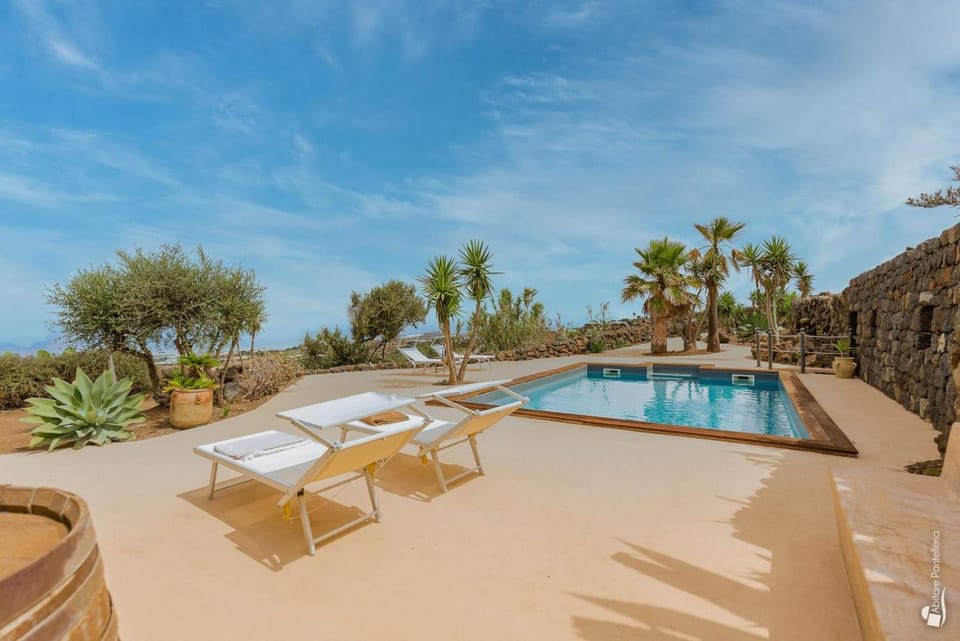 Patio, Natural landscape, Pool view, Swimming pool, sunbed