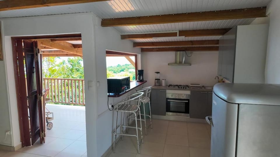 Dining area, minibar, oven, stove