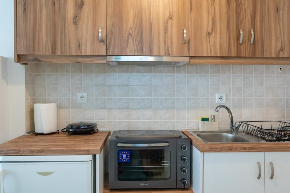 Kitchen or kitchenette, stove, toaster