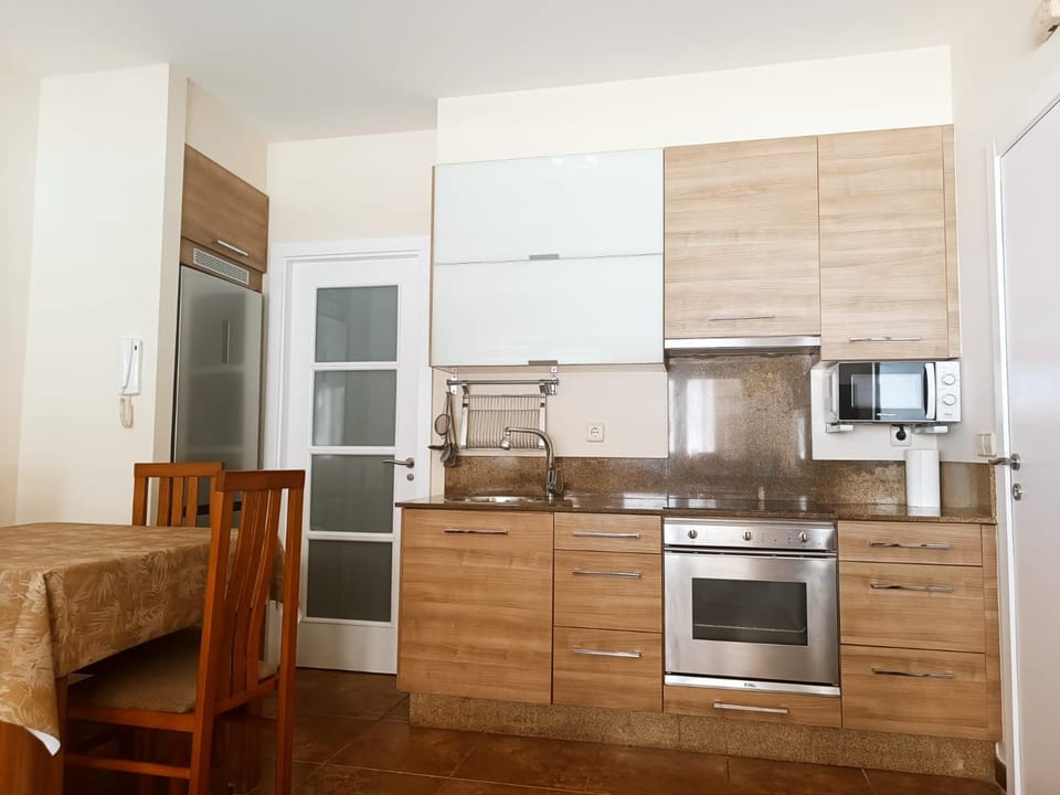 Kitchen or kitchenette, oven, stove