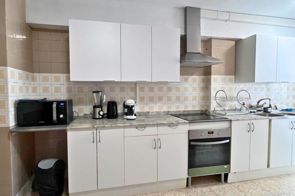 Kitchen or kitchenette, stove