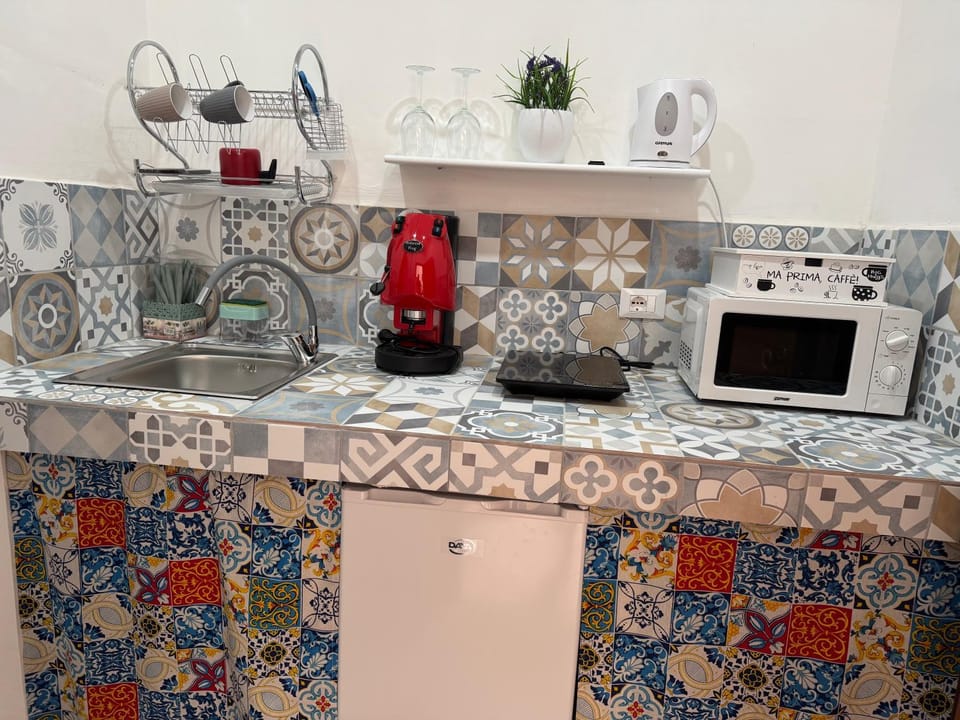 Kitchen or kitchenette, stove