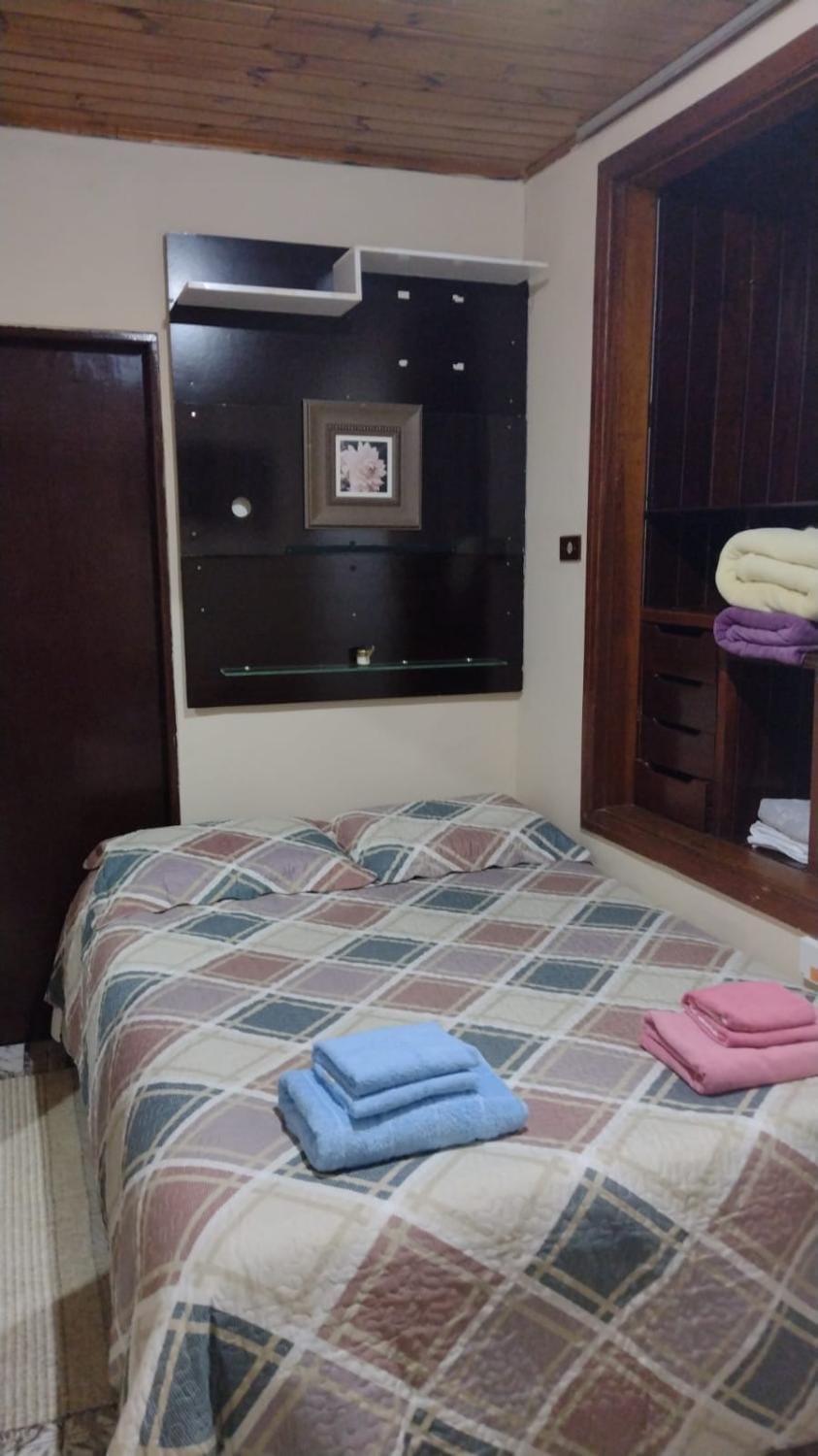Bed, TV and multimedia, Bedroom, towels, wardrobe