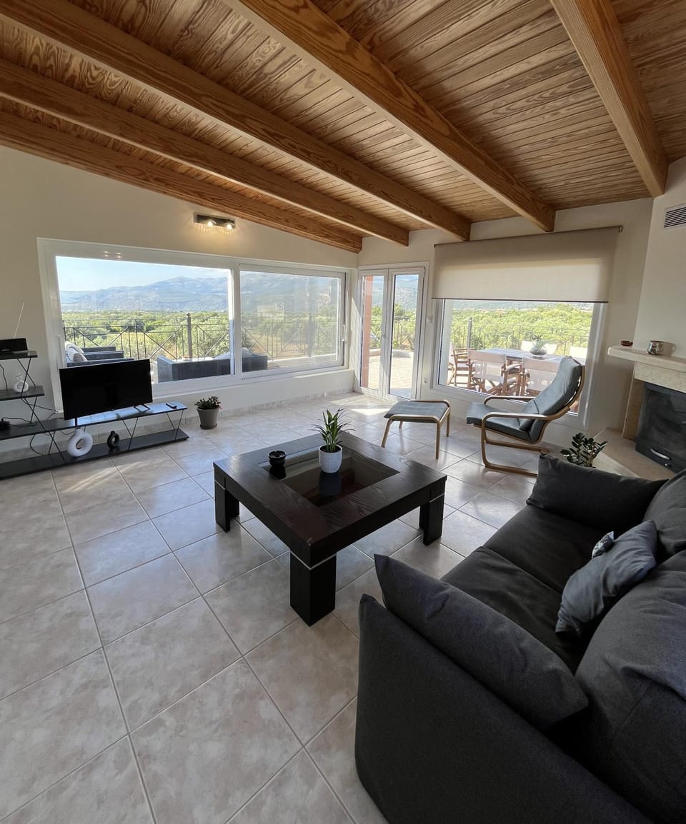 View (from property/room), Living room, Seating area, Mountain view