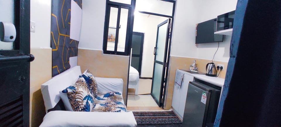 Bed, TV and multimedia, Coffee/tea facilities, Kitchen or kitchenette, Living room, Photo of the whole room, Seating area, Dining area, Bedroom, oven, stove, toaster