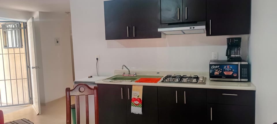 Kitchen or kitchenette, stove