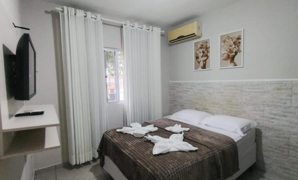 Bed, Photo of the whole room, Bedroom, towels, air conditioner