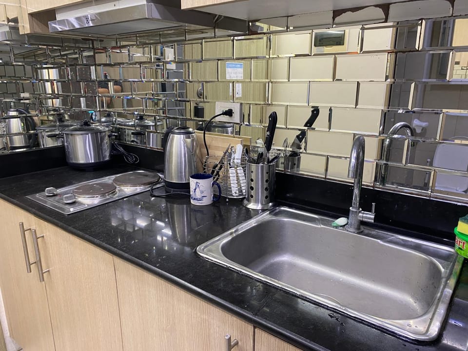Kitchen or kitchenette, stove