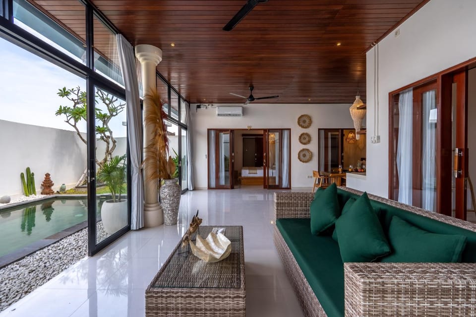 Living room, Seating area, Pool view