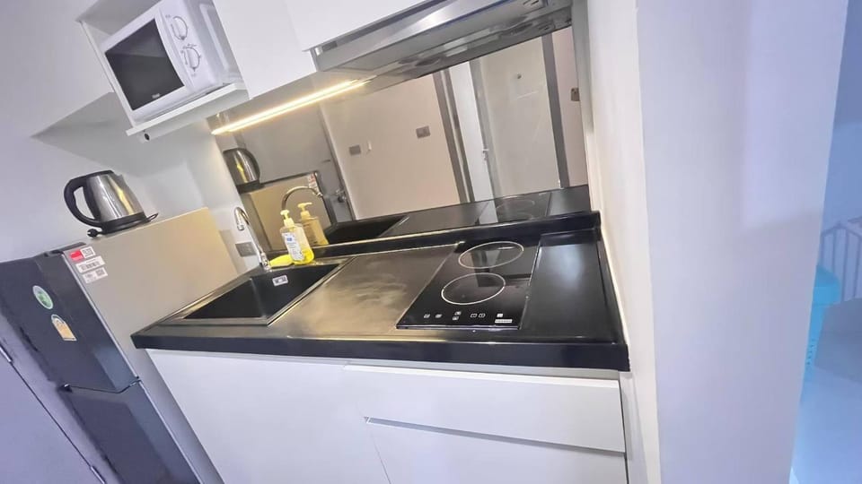 Kitchen or kitchenette, stove