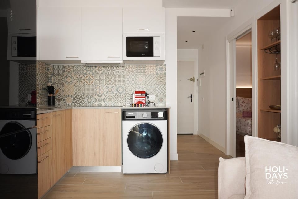 Kitchen or kitchenette, washing machine