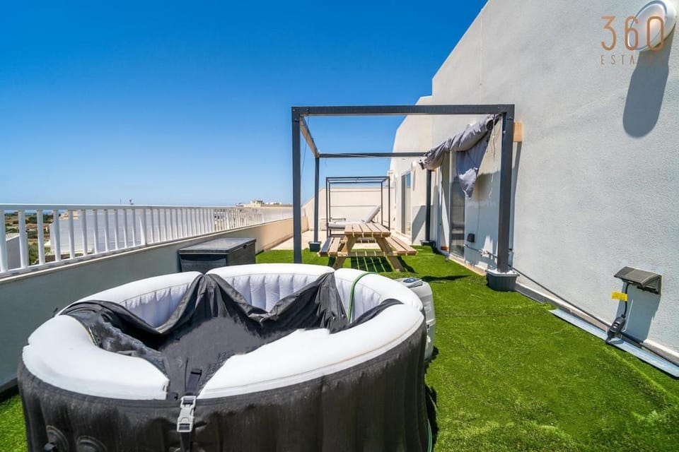 Patio, Natural landscape, View (from property/room), Living room, Seating area, Sea view