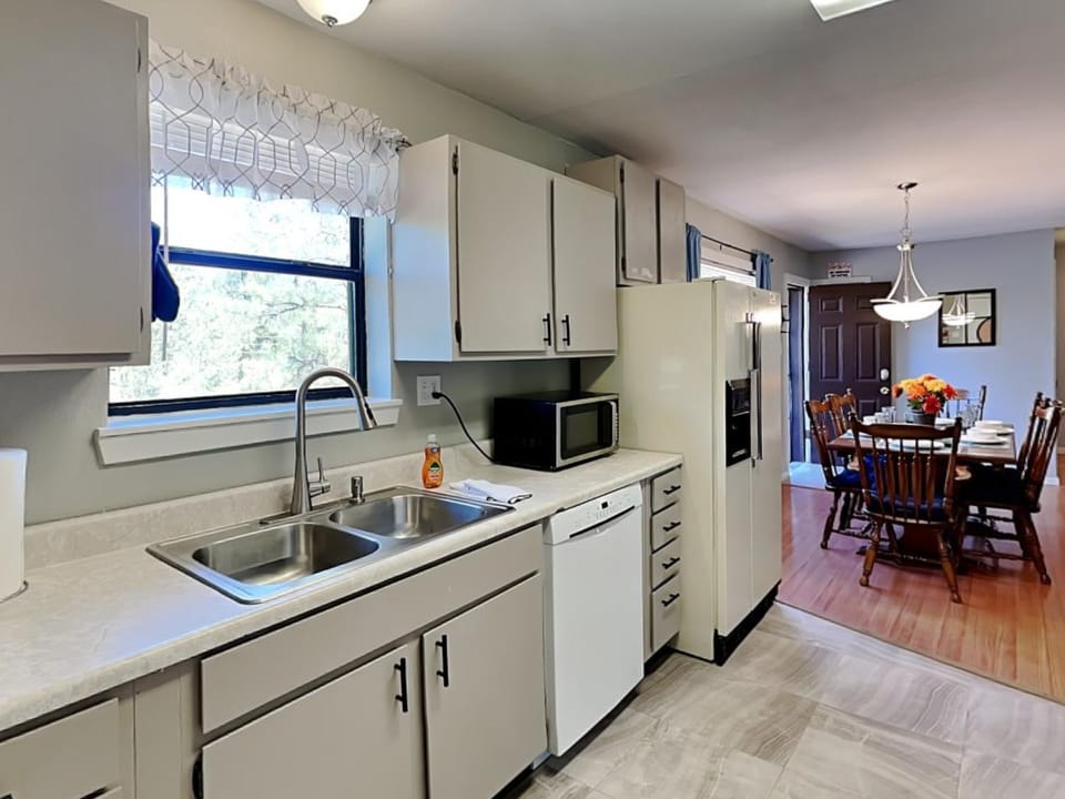 Kitchen or kitchenette, Dining area, furniture, microwave