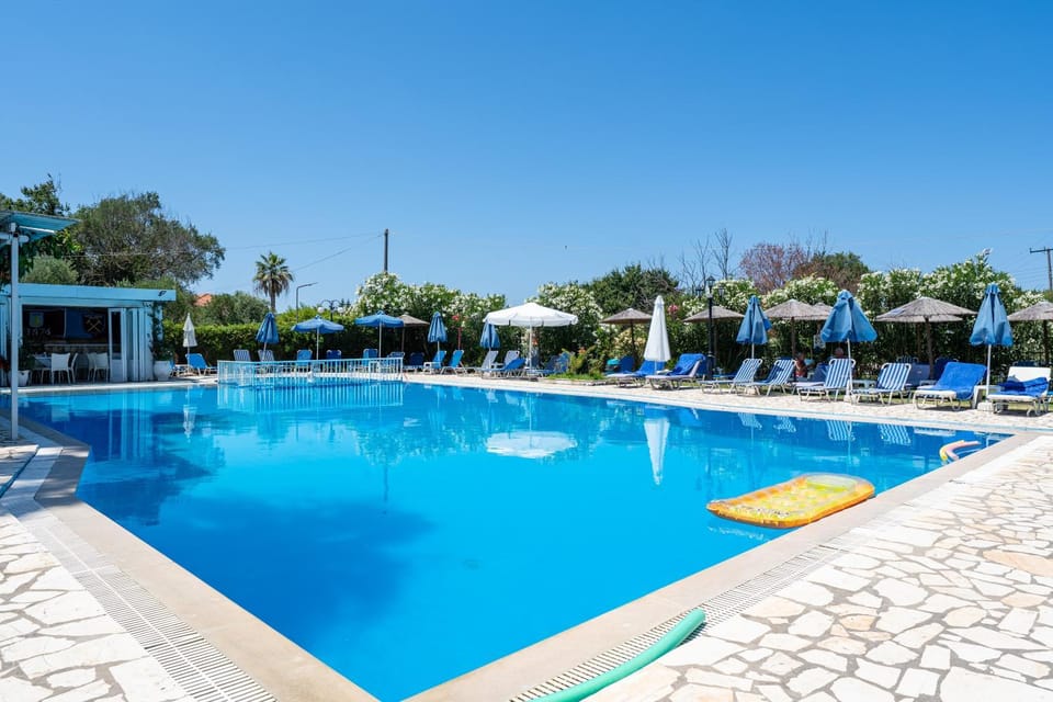Property building, Living room, Swimming pool