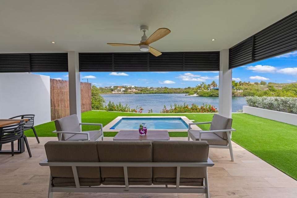 Balcony/Terrace, Seating area, Dining area, Lake view, Pool view, Swimming pool