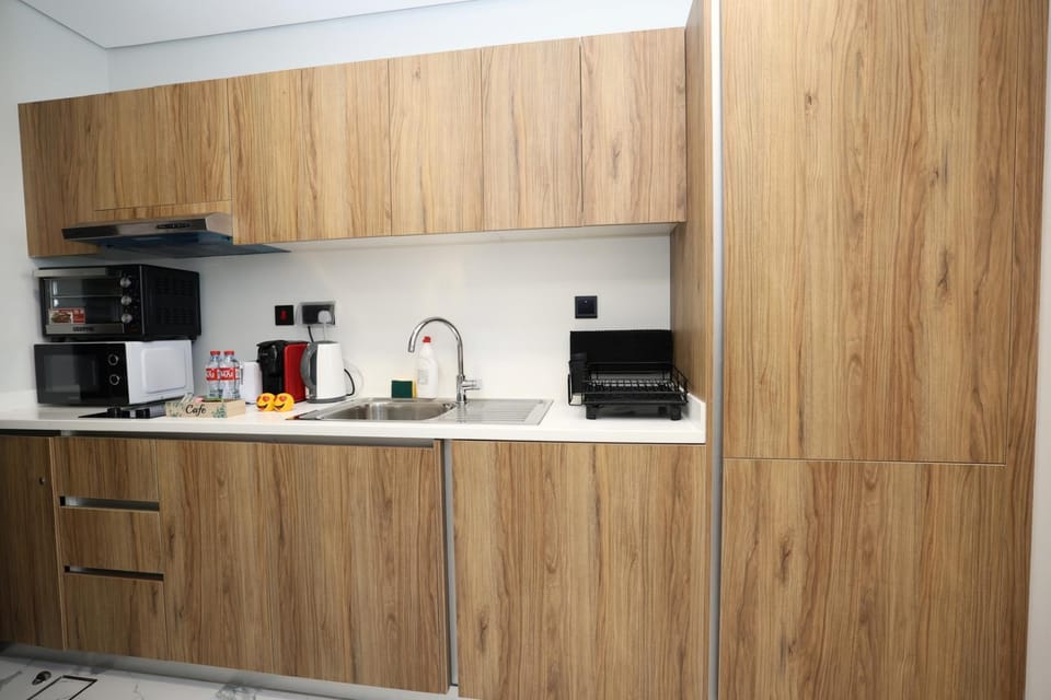 Coffee/tea facilities, Kitchen or kitchenette, oven, stove, toaster, washing machine