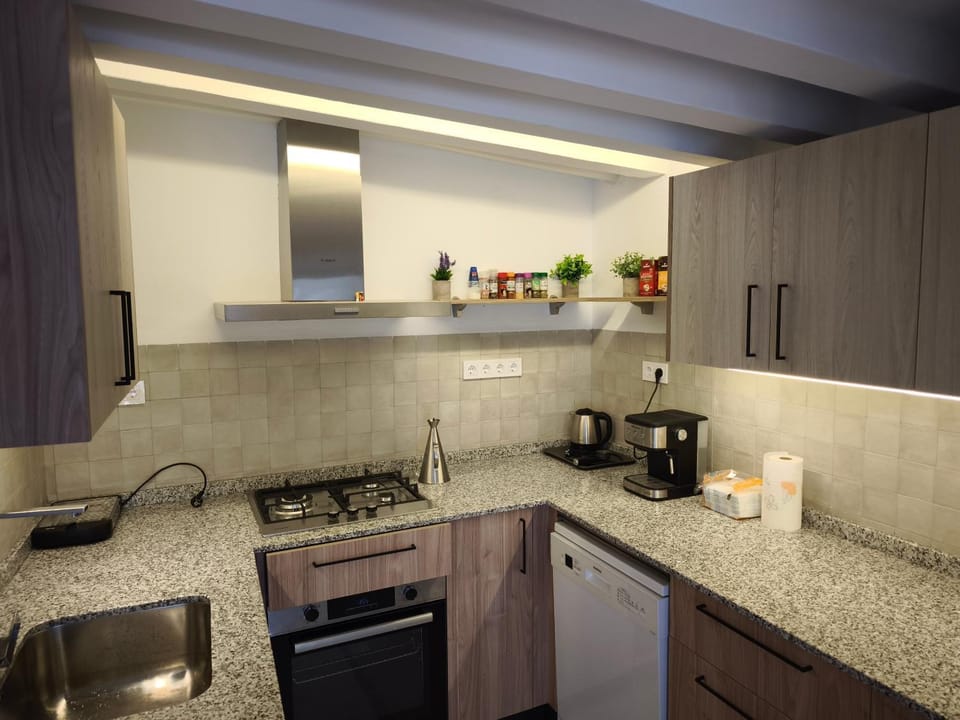 Kitchen or kitchenette, stove, kitchen