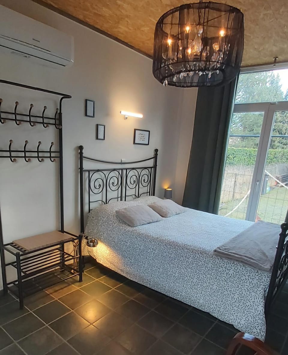 Le tiny de Laly - climatisation -wifi - jardin - airport navette House in Wallonia, Belgium