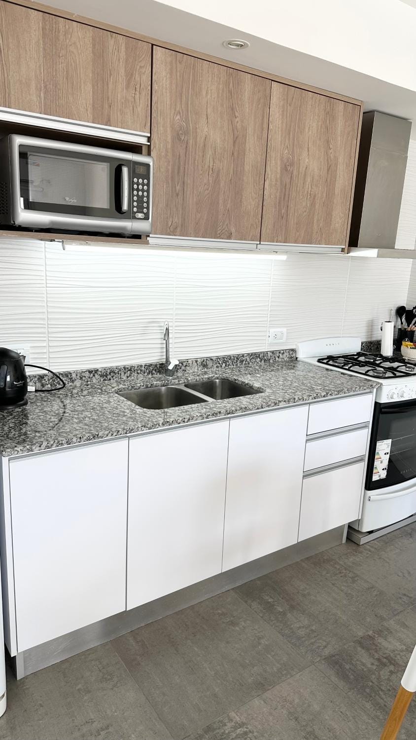 Kitchen or kitchenette, microwave, stove