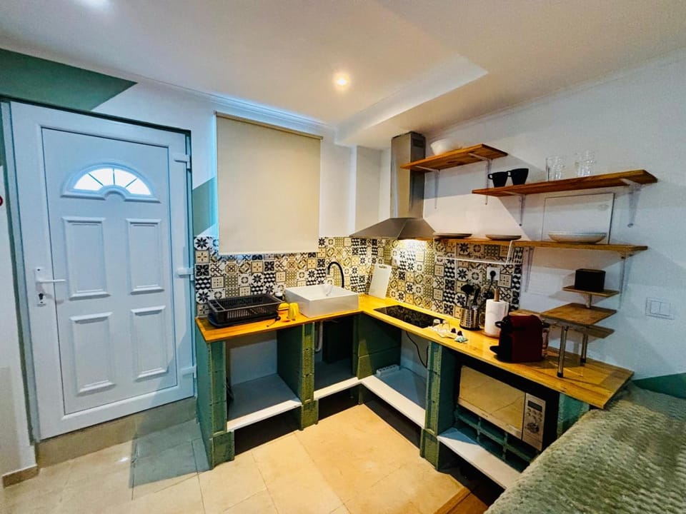 Kitchen or kitchenette, stove