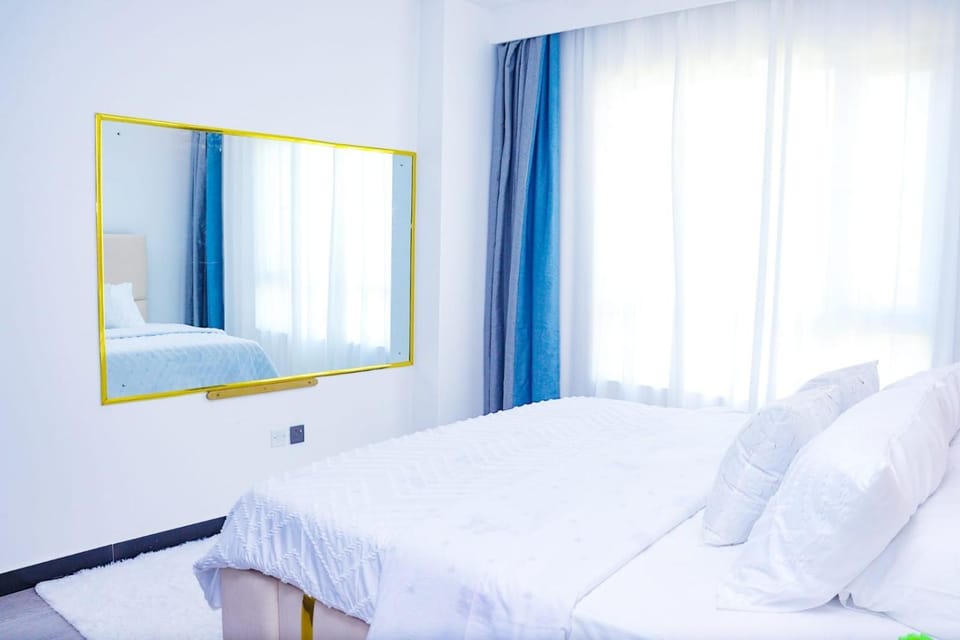 classy executive two bedroom apartment with fully equipped gym ample parking space heated swimming pool children playing ground and amazing scenic views Apartment in Nairobi County