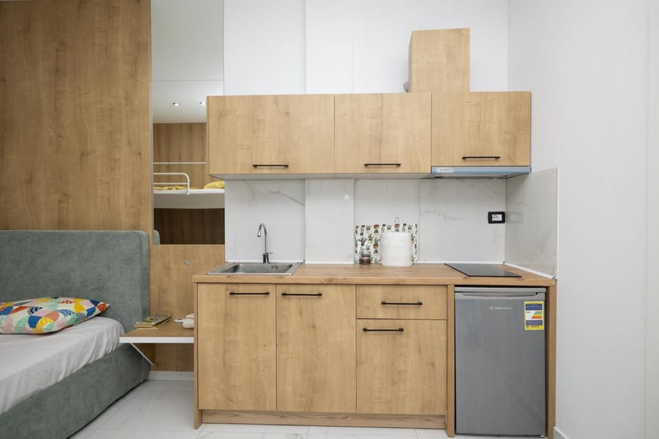 Kitchen or kitchenette, stove