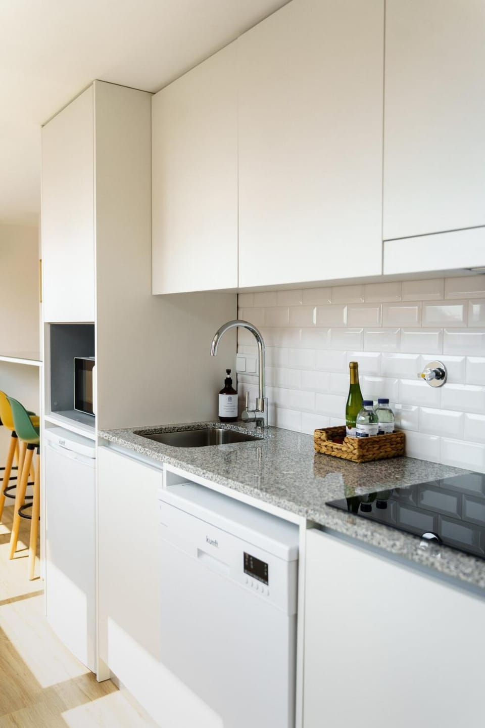 Kitchen or kitchenette, dishwasher, oven, stove