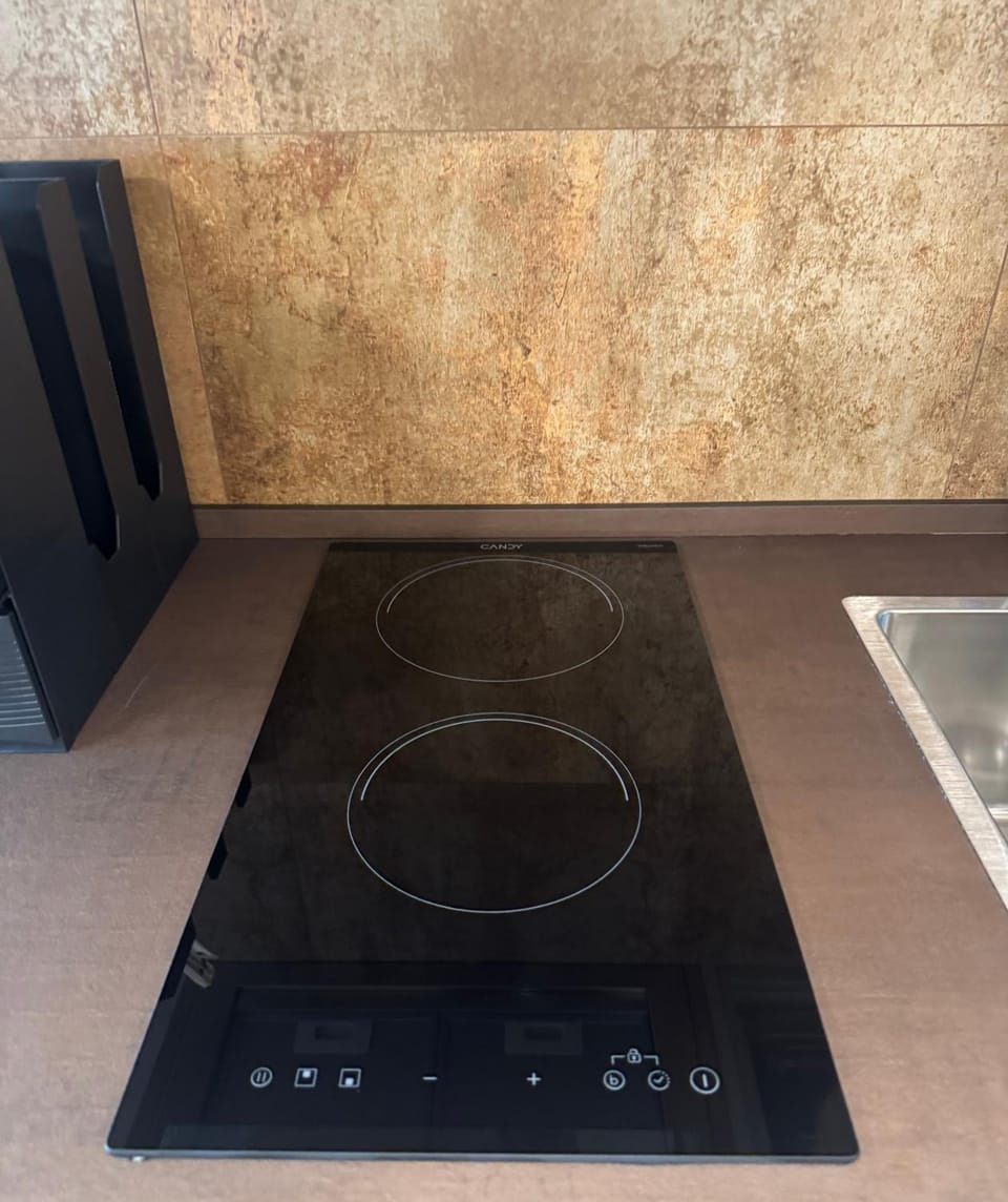 Kitchen or kitchenette, stove