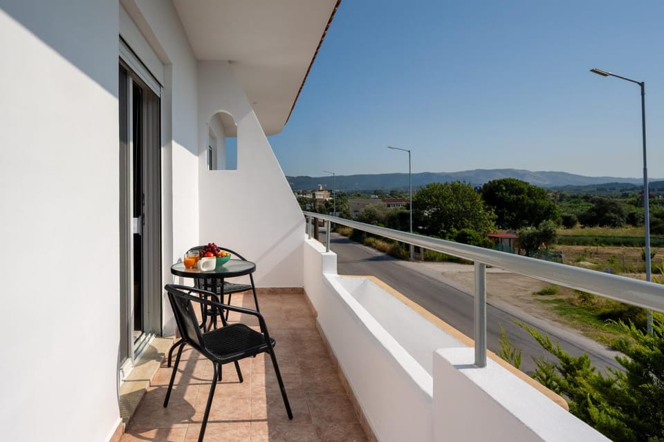Property building, Patio, Natural landscape, Balcony/Terrace