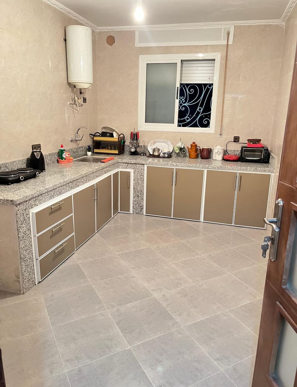 Kitchen or kitchenette, stove, toaster