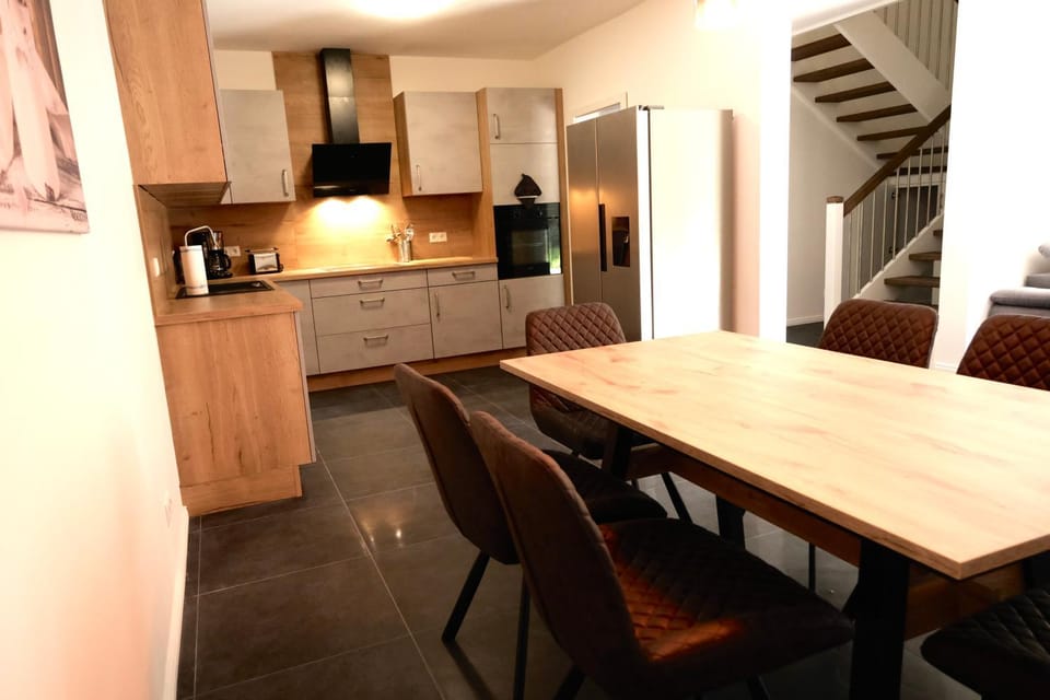 Kitchen or kitchenette, Seating area, Dining area, dishwasher, oven, stove