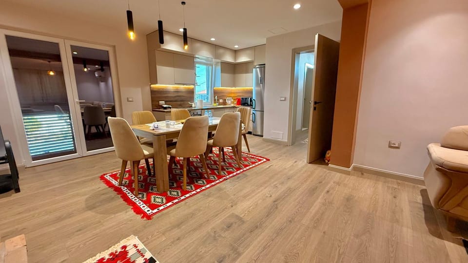 Kitchen or kitchenette, Living room, Seating area, Dining area