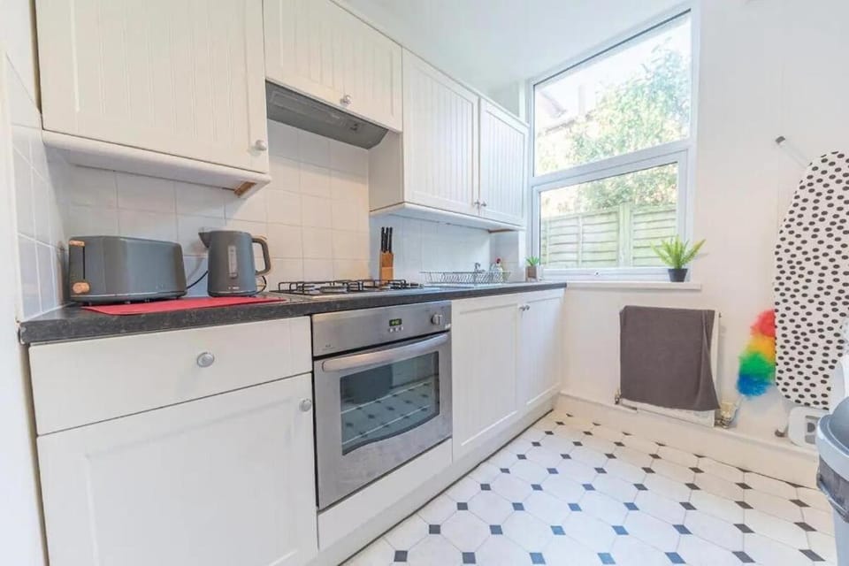 Kitchen or kitchenette, oven, stove
