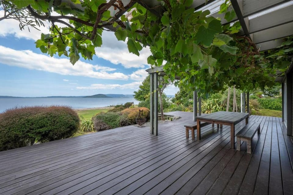 Lounge to Lake Rotorua House in Rotorua